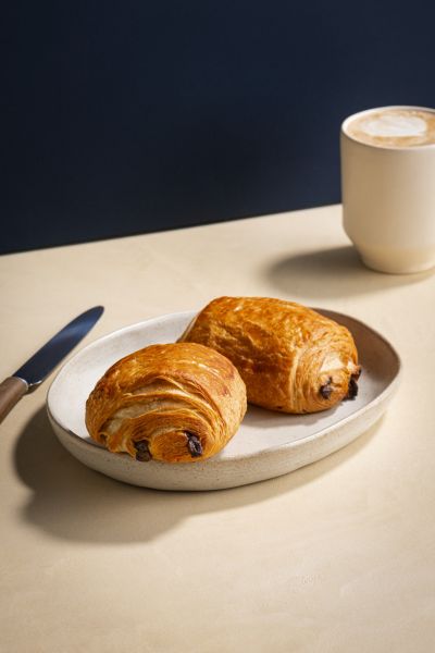 Chocolate croissants with a latte