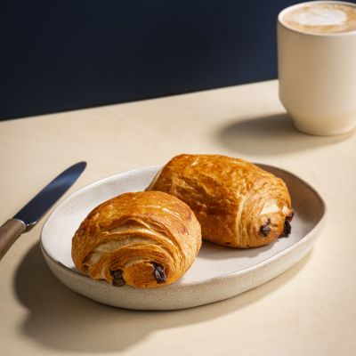 Chocolate croissants with a latte