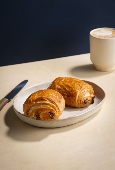 Chocolate croissants with a latte
