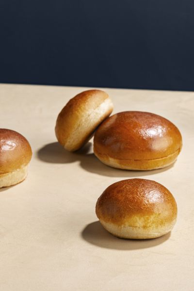 Golden glazed brioche buns