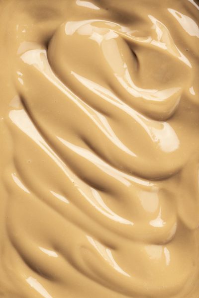 Swirl of caramel dessert texture, close-up