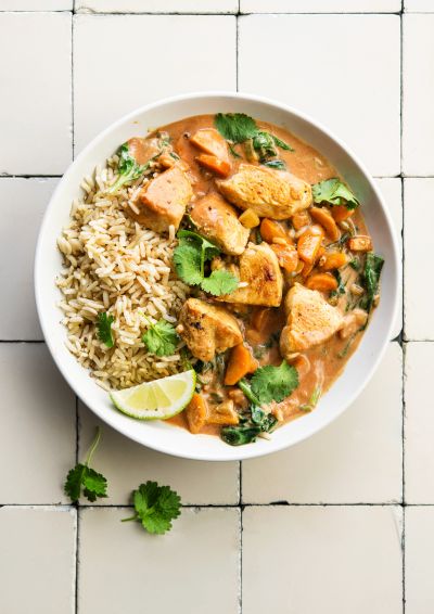 Coconut curry chicken with wholegrain rice, lime and coriander