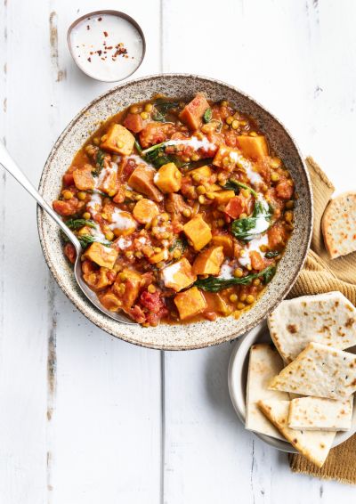 Coconut lentil dahl with sweet potato and naan bread