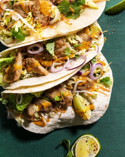 Thai-style wrap with peanut sauce and fresh herbs
