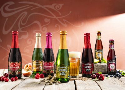 Lindemans Geuze and Kriek beer bottle lineup with fruit