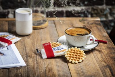 Coffee served with Lotus Biscoff crunchy waffle biscuit