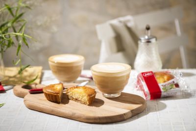 Tartelice pastries served with coffee on a board