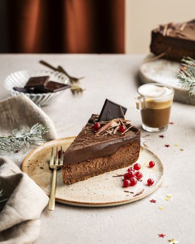 Philadelphia chocolate cheesecake slice with festive styling