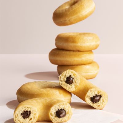 Plain donuts with hazelnut cream filling, stacked