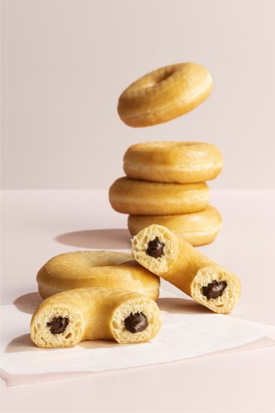 Plain donuts with hazelnut cream filling, stacked