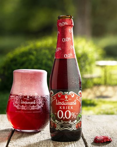 Kriek Bottle Next To Filled Tumbler Glass Open Bottle 4x5 &mdash; AI-enhanced food photography by Foodphoto